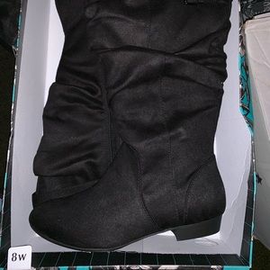 Lower East Side Raven Boots.